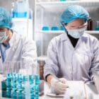 Health care researchers working in life science laboratory, medical science technology research